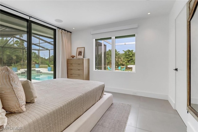 bedroom with baseboards, a sunroom, access to exterior, tile patterned flooring, and recessed lighting