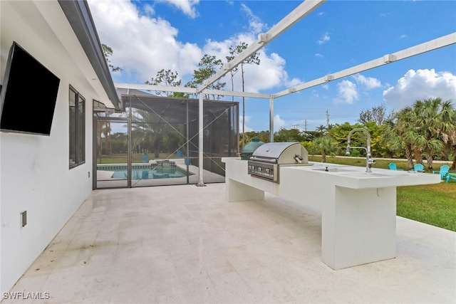 view of patio / terrace featuring glass enclosure, an outdoor kitchen, area for grilling, a sink, and an outdoor pool