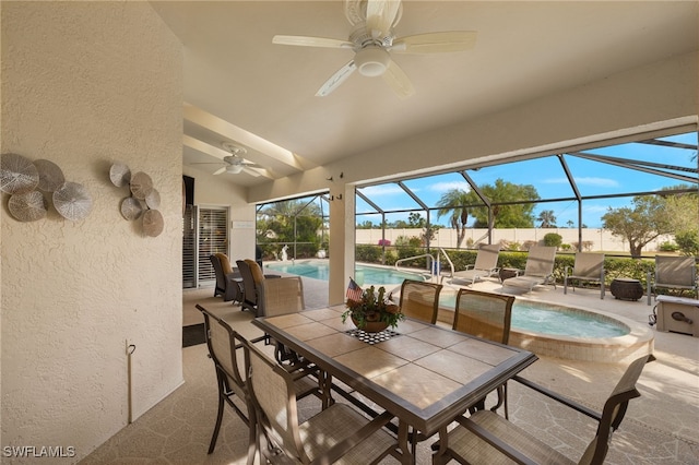 sunroom featuring lofted ceiling and a pool