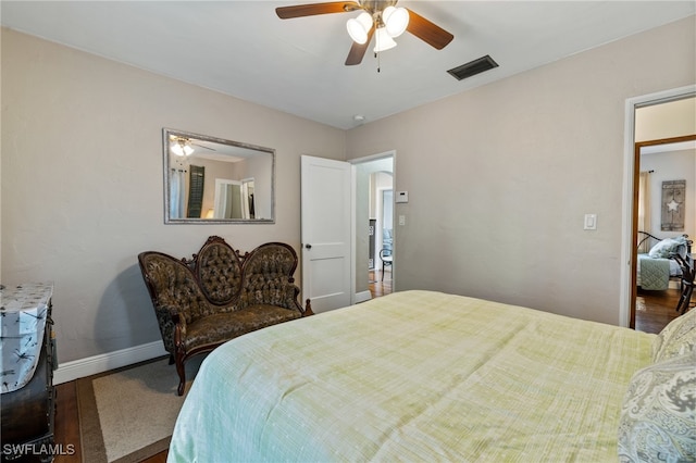 bedroom featuring wood-type flooring and ceiling fan