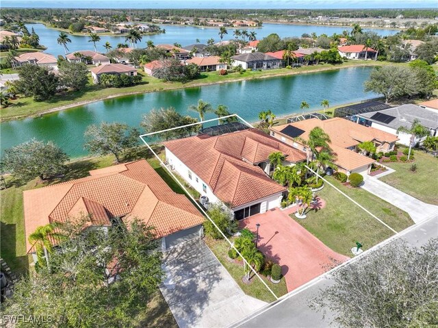 bird's eye view with a water view