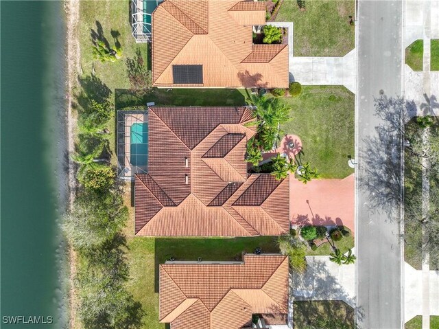 bird's eye view with a water view