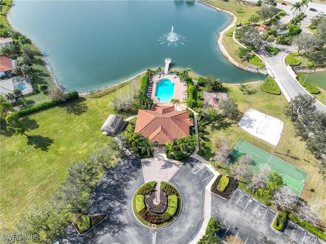 birds eye view of property featuring a water view