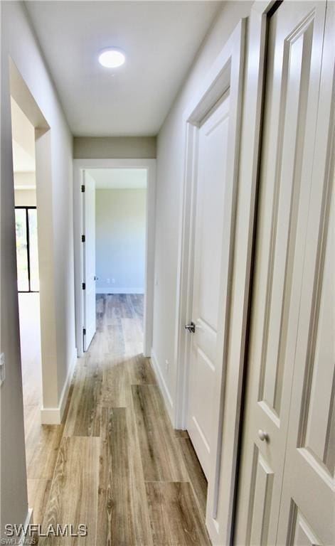 hall featuring light wood-type flooring