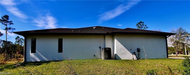 view of home's exterior featuring a yard