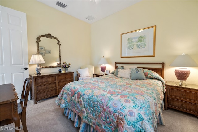 bedroom featuring carpet and visible vents