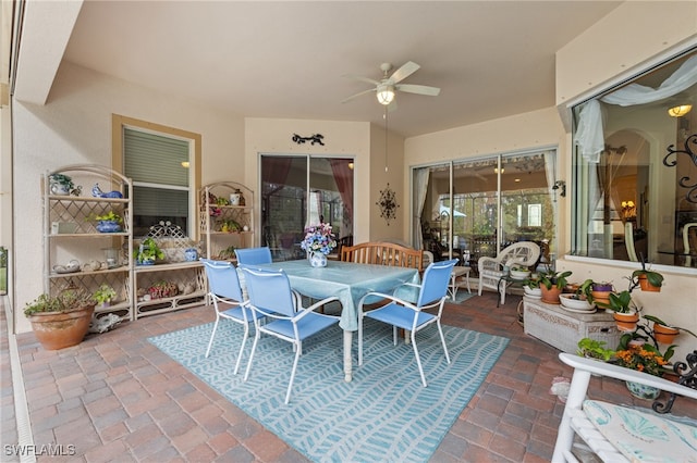 view of patio / terrace featuring ceiling fan