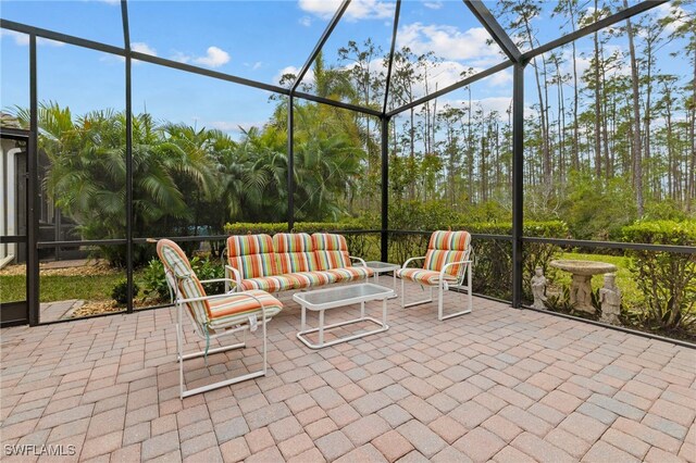 unfurnished sunroom featuring an outdoor living space