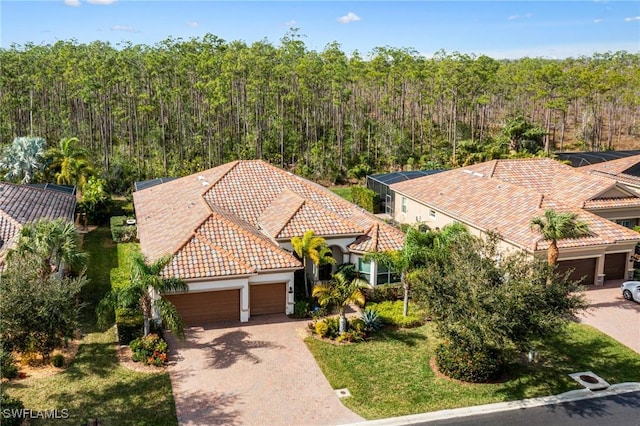 bird's eye view with a forest view