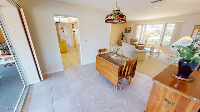 view of tiled dining space