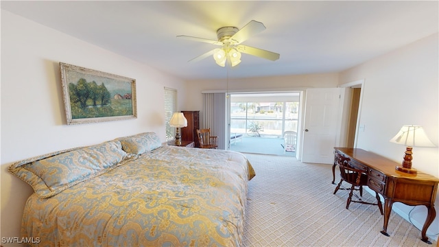 carpeted bedroom with access to outside and ceiling fan