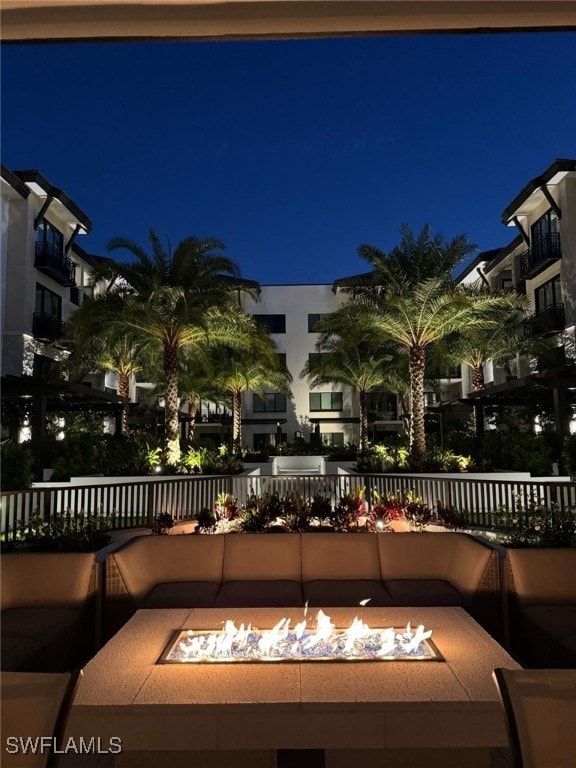 patio at twilight with a fire pit