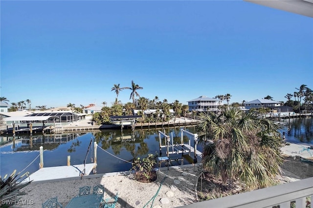 dock area with a water view