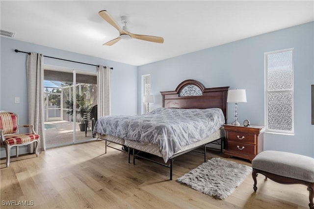 bedroom with access to outside, ceiling fan, and light hardwood / wood-style floors