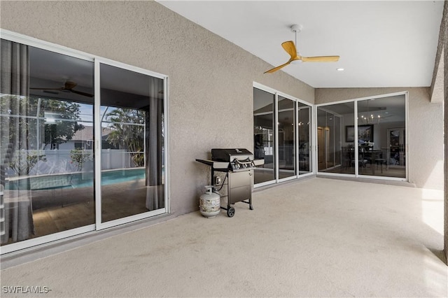 view of patio / terrace with area for grilling and ceiling fan