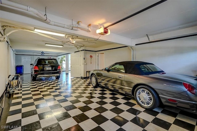 garage featuring a garage door opener