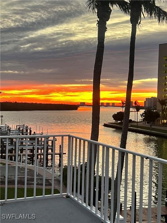 balcony at dusk with a water view