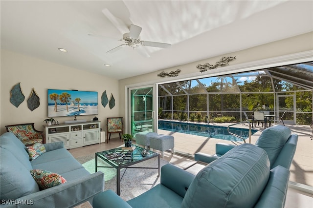 living room with lofted ceiling, a sunroom, ceiling fan, and recessed lighting