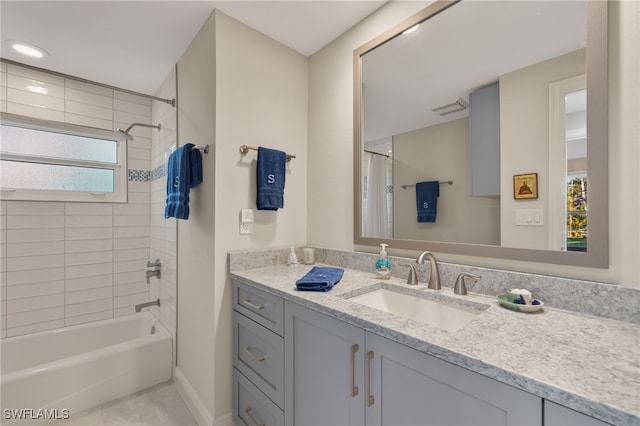 bathroom with vanity, visible vents, and shower / tub combo with curtain