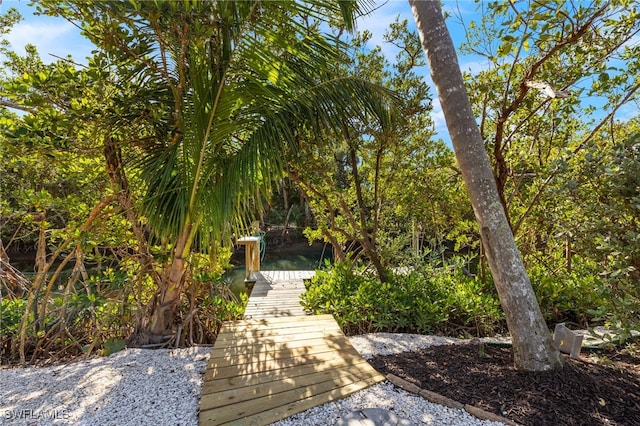 surrounding community featuring a dock