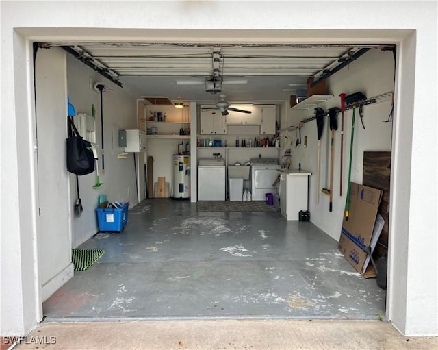 1374 Eagle Way, Fort Myers, FL 33919 - garage featuring electric water heater, washer and clothes dryer, fridge, a garage door opener, and a sink