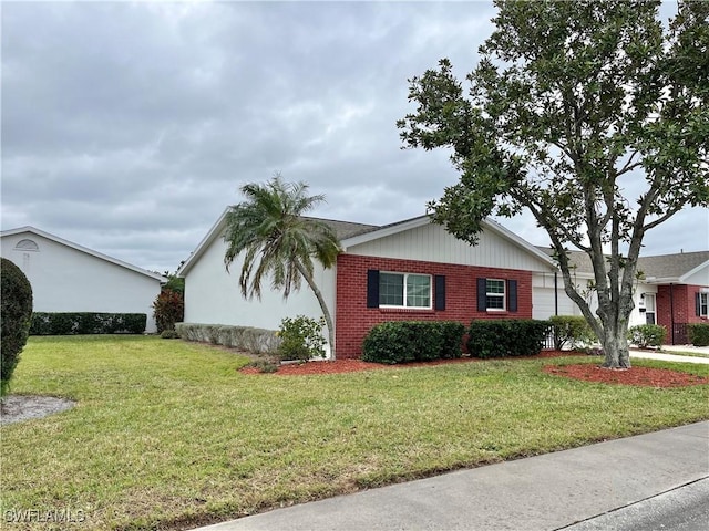 view of property exterior with a lawn