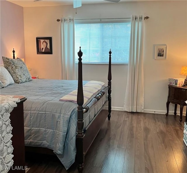 bedroom featuring dark hardwood / wood-style flooring