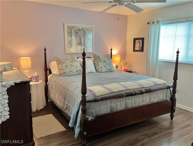 bedroom featuring ceiling fan and dark hardwood / wood-style floors