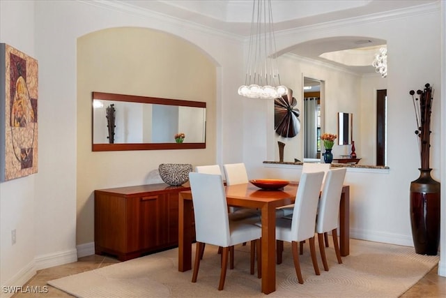 tiled dining room with ornamental molding