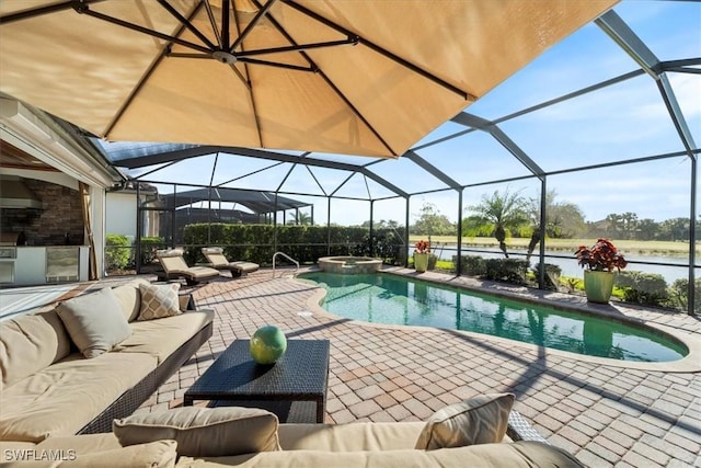 view of swimming pool featuring outdoor lounge area, an in ground hot tub, a lanai, a water view, and a patio area