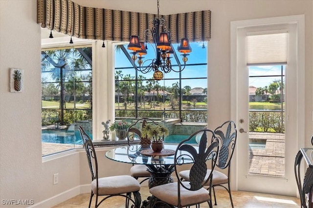 dining room with a chandelier