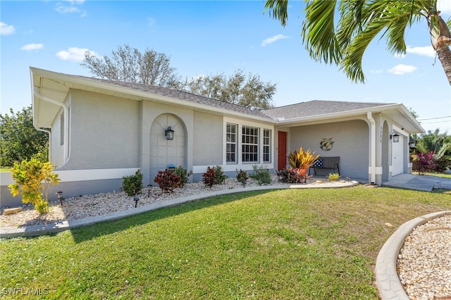 ranch-style house with a front lawn and a garage