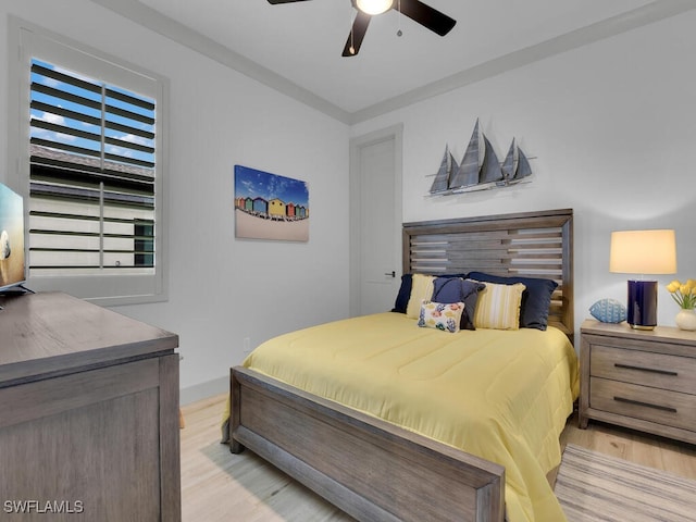 bedroom featuring ceiling fan and light wood-type flooring