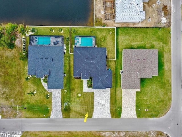 aerial view featuring a water view