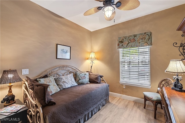 bedroom with light wood-type flooring and ceiling fan