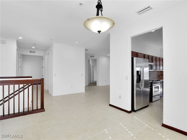 interior space with light tile patterned floors