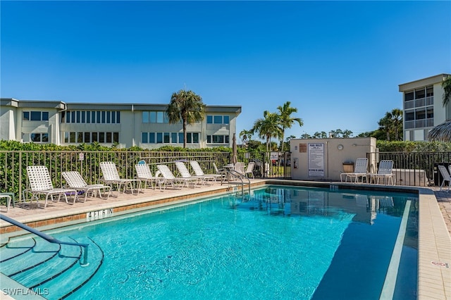 view of pool featuring a patio area