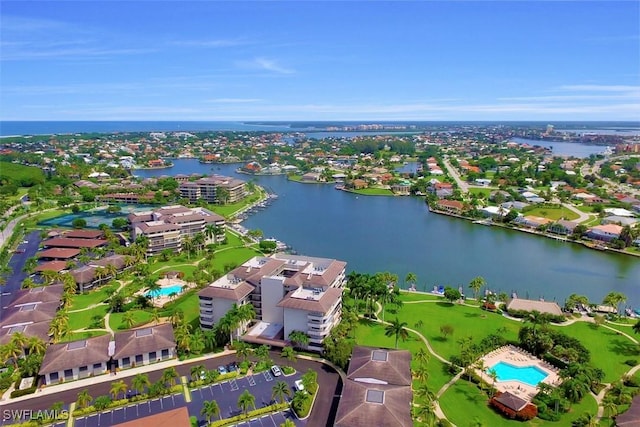 bird's eye view with a water view