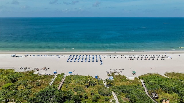 drone / aerial view with a view of the beach and a water view