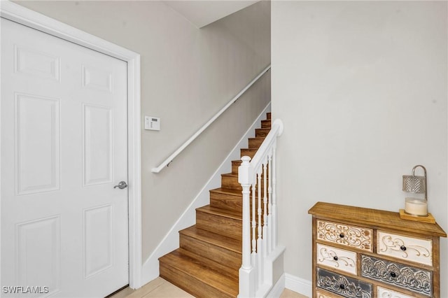 stairs with baseboards