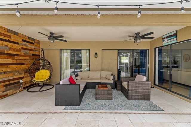 2451 River Reach Dr, Naples, FL 34104 - view of patio / terrace featuring a ceiling fan and outdoor lounge area
