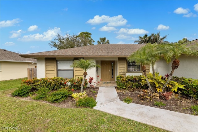 view of front of home with a front yard