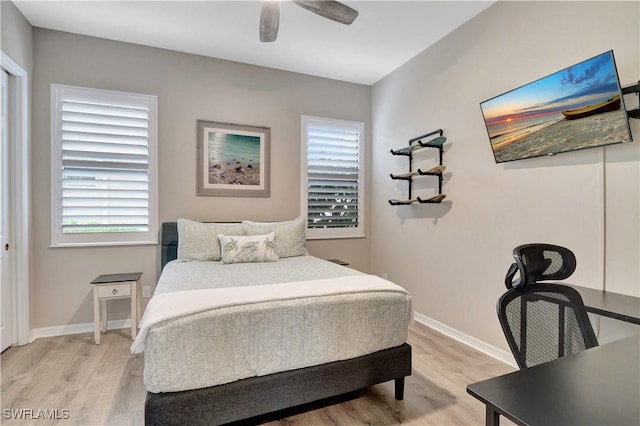 bedroom featuring ceiling fan and light wood-type flooring