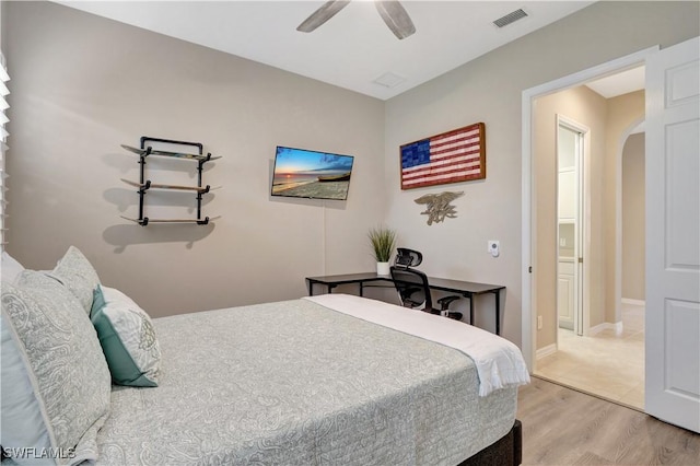 bedroom featuring ceiling fan and wood-type flooring