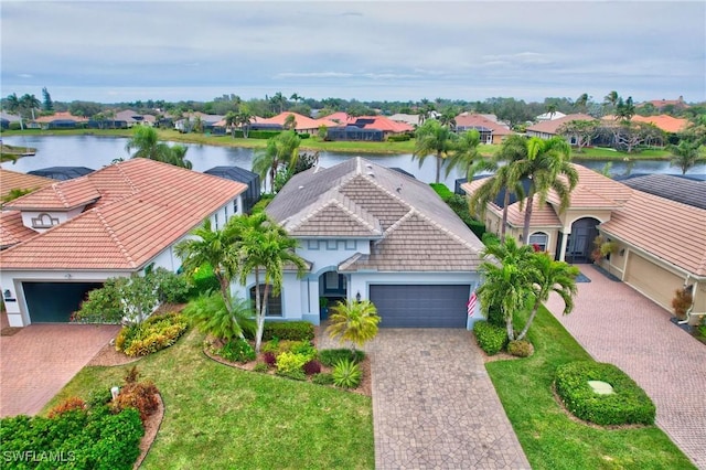 drone / aerial view featuring a water view