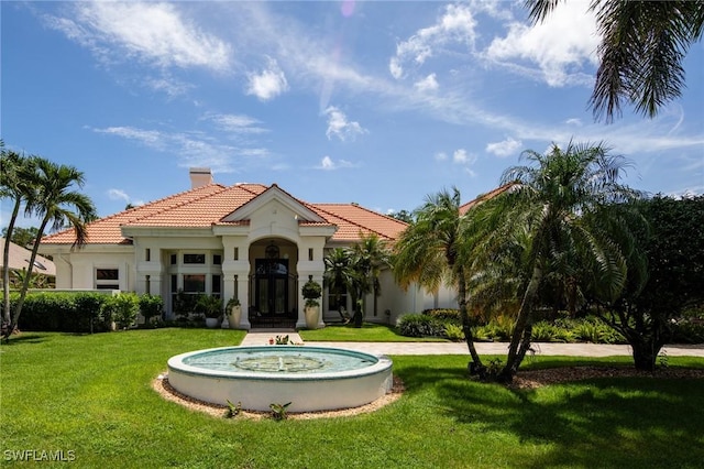 view of front facade with a front lawn