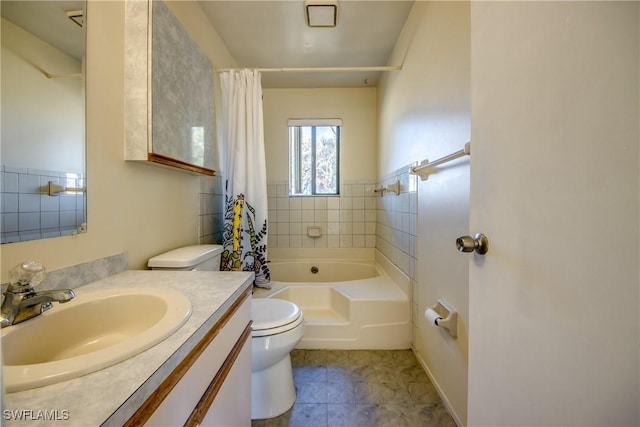 full bathroom featuring shower / bathtub combination with curtain, vanity, and toilet