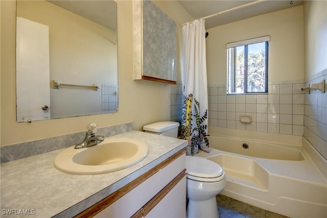 full bathroom featuring toilet, vanity, and shower / bathtub combination with curtain