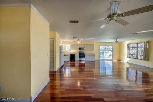 unfurnished living room with dark hardwood / wood-style flooring