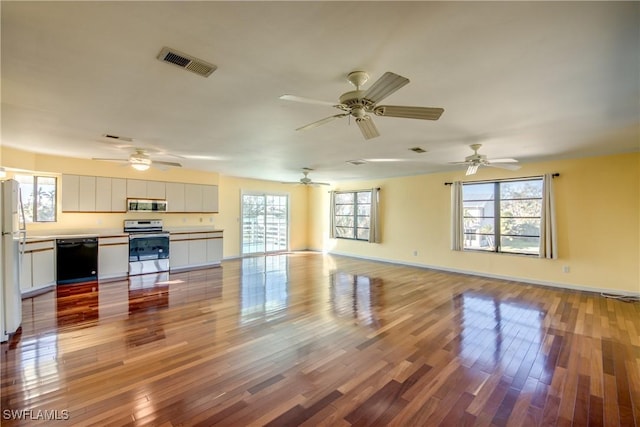 unfurnished living room featuring light hardwood / wood-style flooring